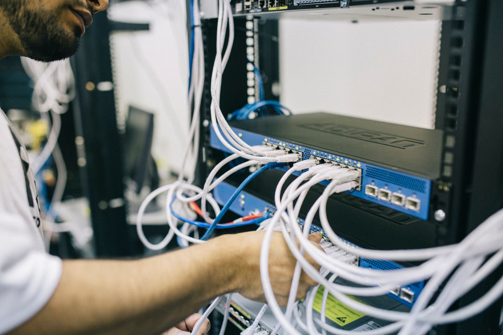 SHAH IT engineer servicing network cabling for a Sydney business